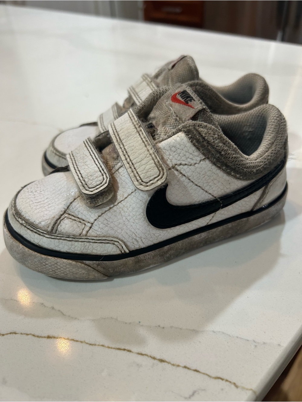 Nike Kids White Sneakers with Black swoosh (9c)